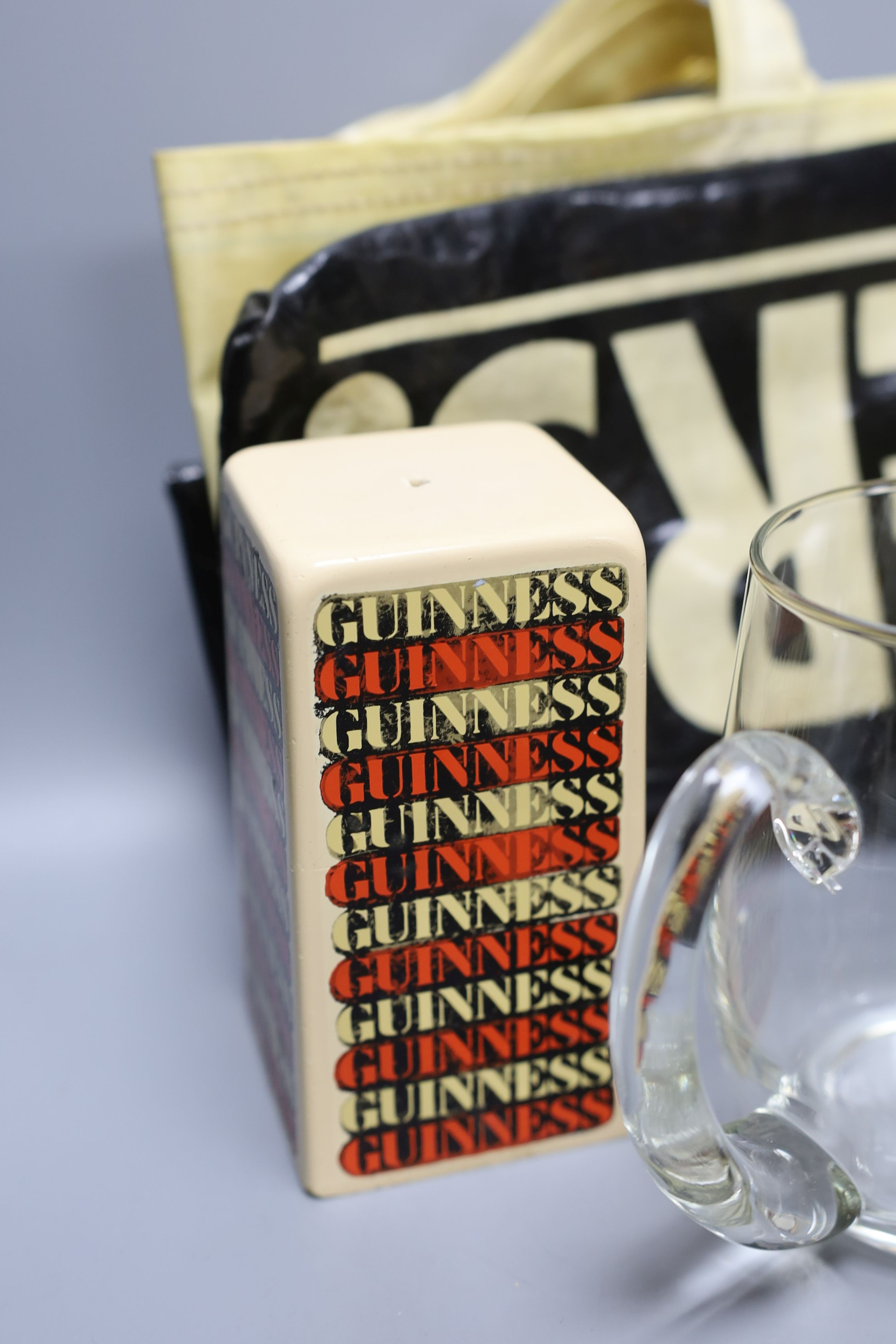 Assorted Guiness memorabilia, a Bells porcelain bottle of whisky, commemorative to the 60th birthday of Her Majesty Queen Elizabeth II